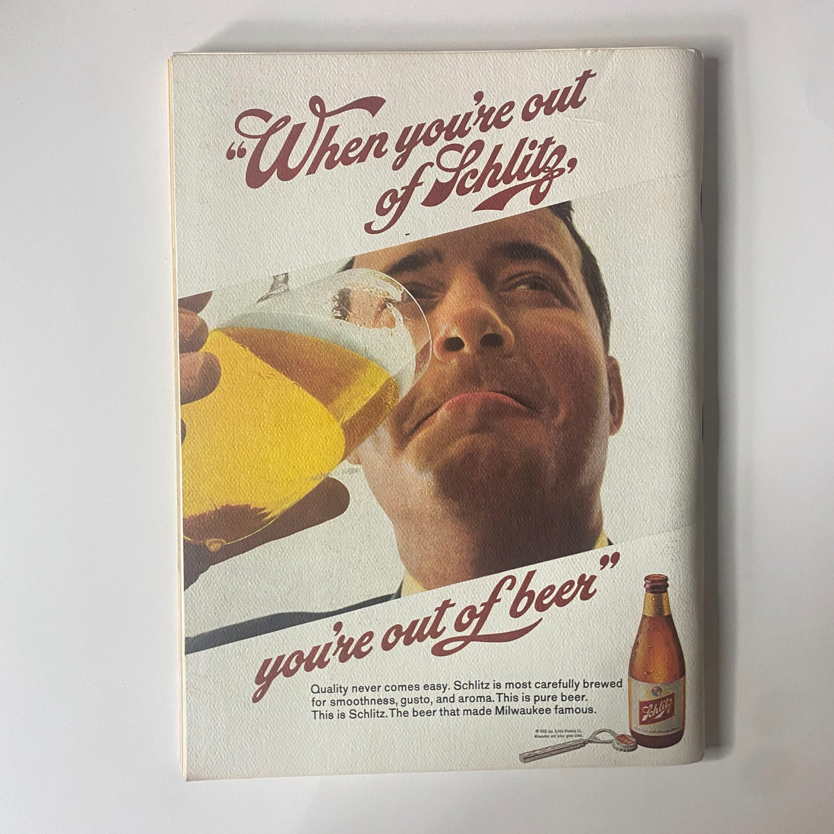 Playboy Magazine January 1969 featuring a vintage advertisement for Schlitz beer, showcasing a man holding a glass of beer with the quote, 'When you're out of Schlitz, you're out of beer'. This image captures the advertising style of the late 1960s.