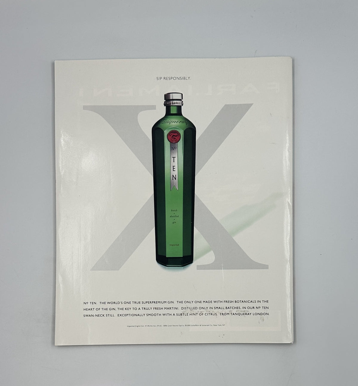 Back cover of George Magazine July 2000, featuring an advertisement for a branded beverage, maintaining the magazine's stylish presentation.