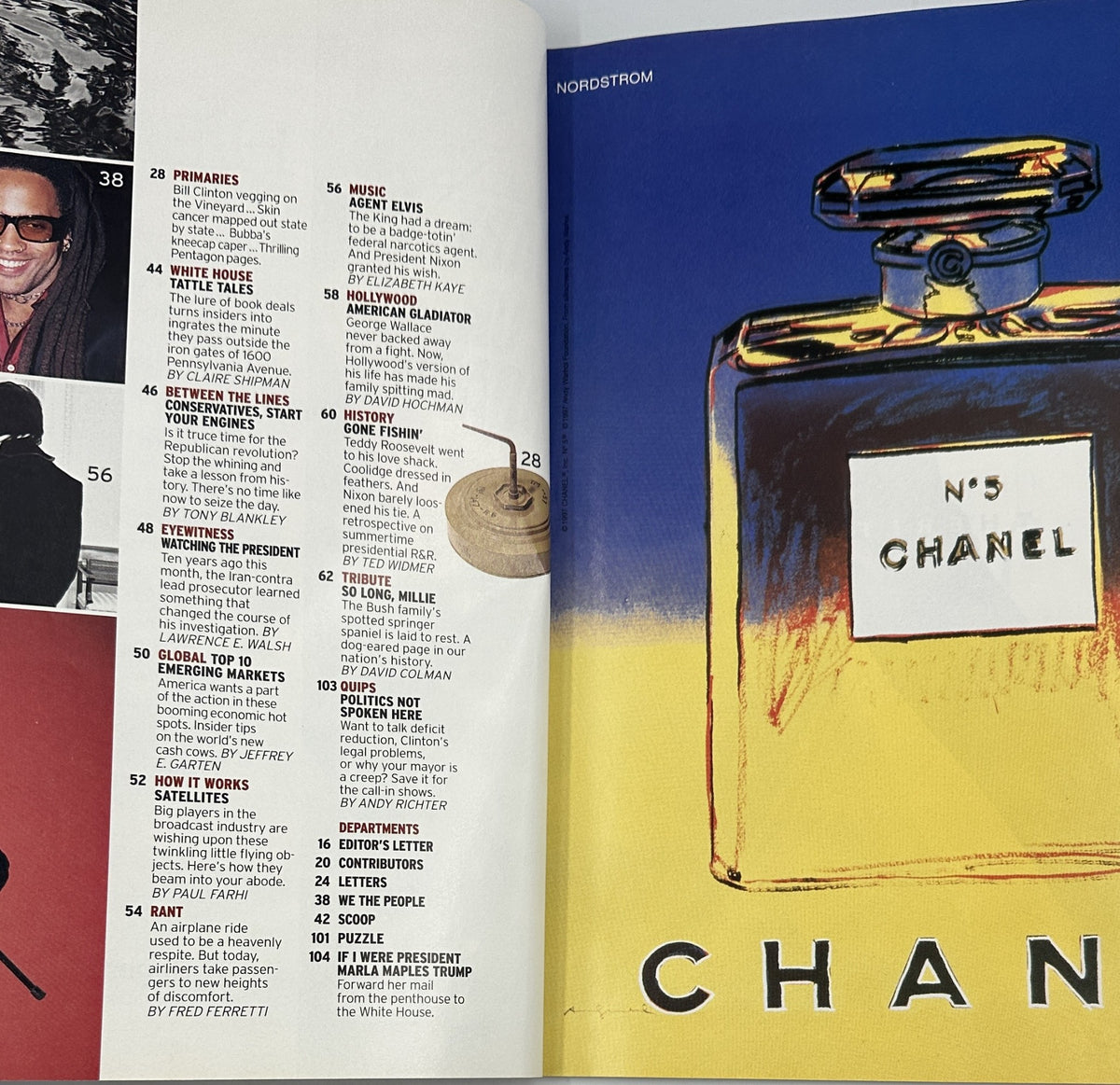 George Magazine August 1997 featuring 'Primaries' article and 'Music: Agent Elvis' section, showcasing a colorful Chanel advertisement with a luxurious perfume bottle.