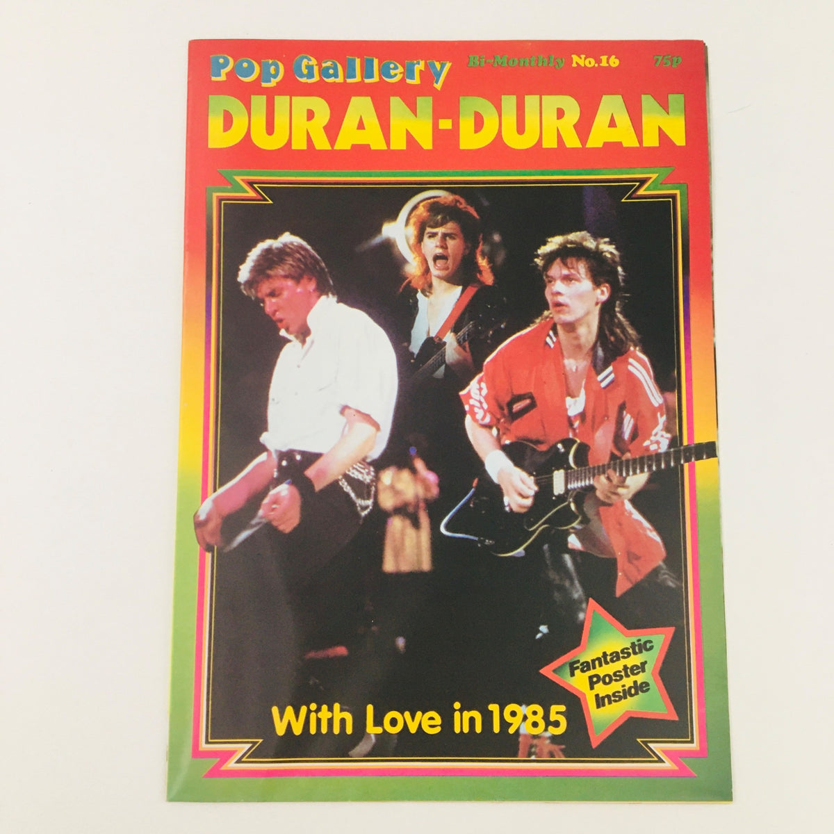 Pop Gallery Poster Magazine #13 Duran Duran With Love in 1985 cover featuring a vibrant design and three band members performing, showcasing the essence of 1980s pop culture.