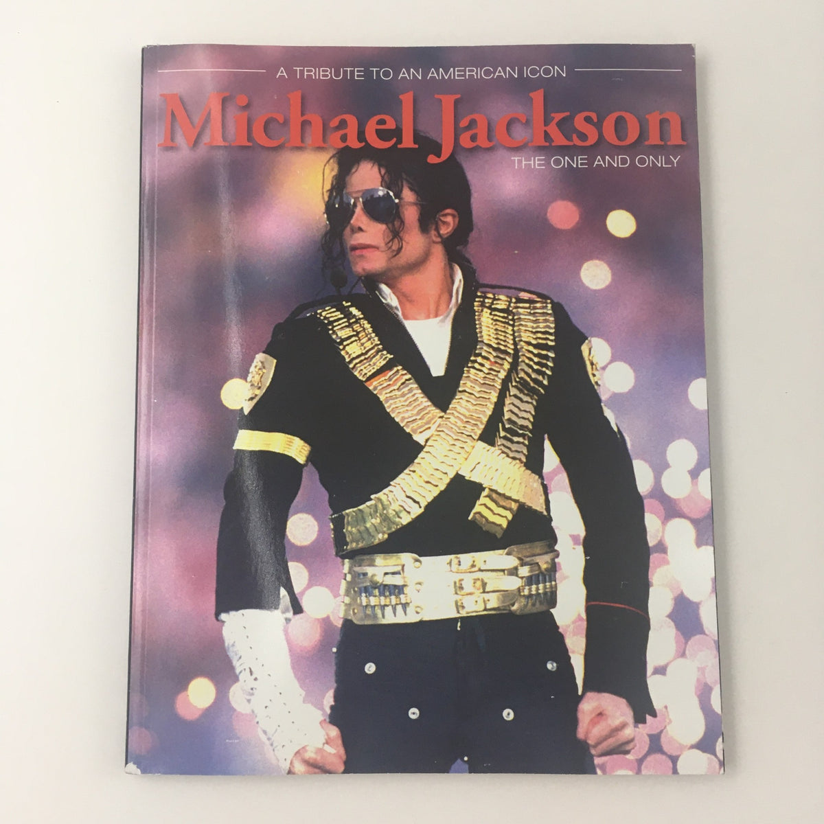 A Tribute To An American Icon: Michael Jackson The One and Only vintage magazine cover featuring Michael Jackson in iconic outfit with sunglasses and sequined gloves, capturing his electrifying stage presence.