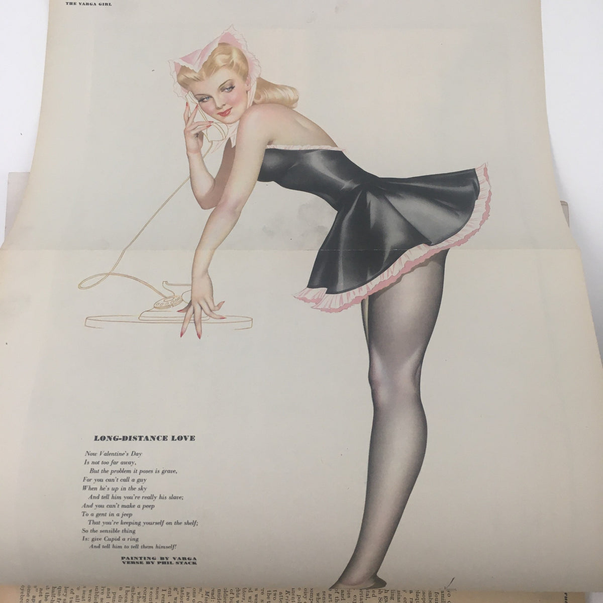 Vintage illustration from Esquire Magazine February 1945 featuring a glamorous pin-up girl in a playful pose on the phone, embodying the fashion and cultural style of the 1940s.