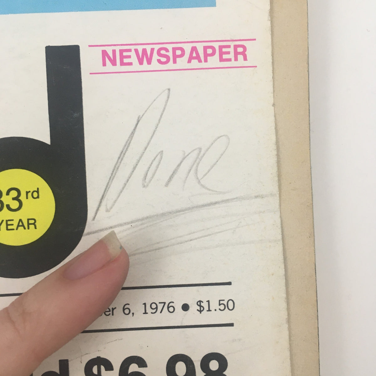 Billboard Newspaper November 6 1976 Mel Tillis & Beatles Reunited Cutout Disks highlighting the cover with a price tag and handwritten note, showcasing the publication details.