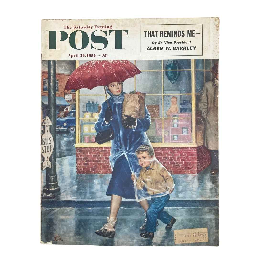 Cover of Saturday Evening Post Magazine from April 24, 1954, featuring a vibrant illustration of a woman with an umbrella and a child in the rain, titled 'Buddy Genius' by Amos Sewell.