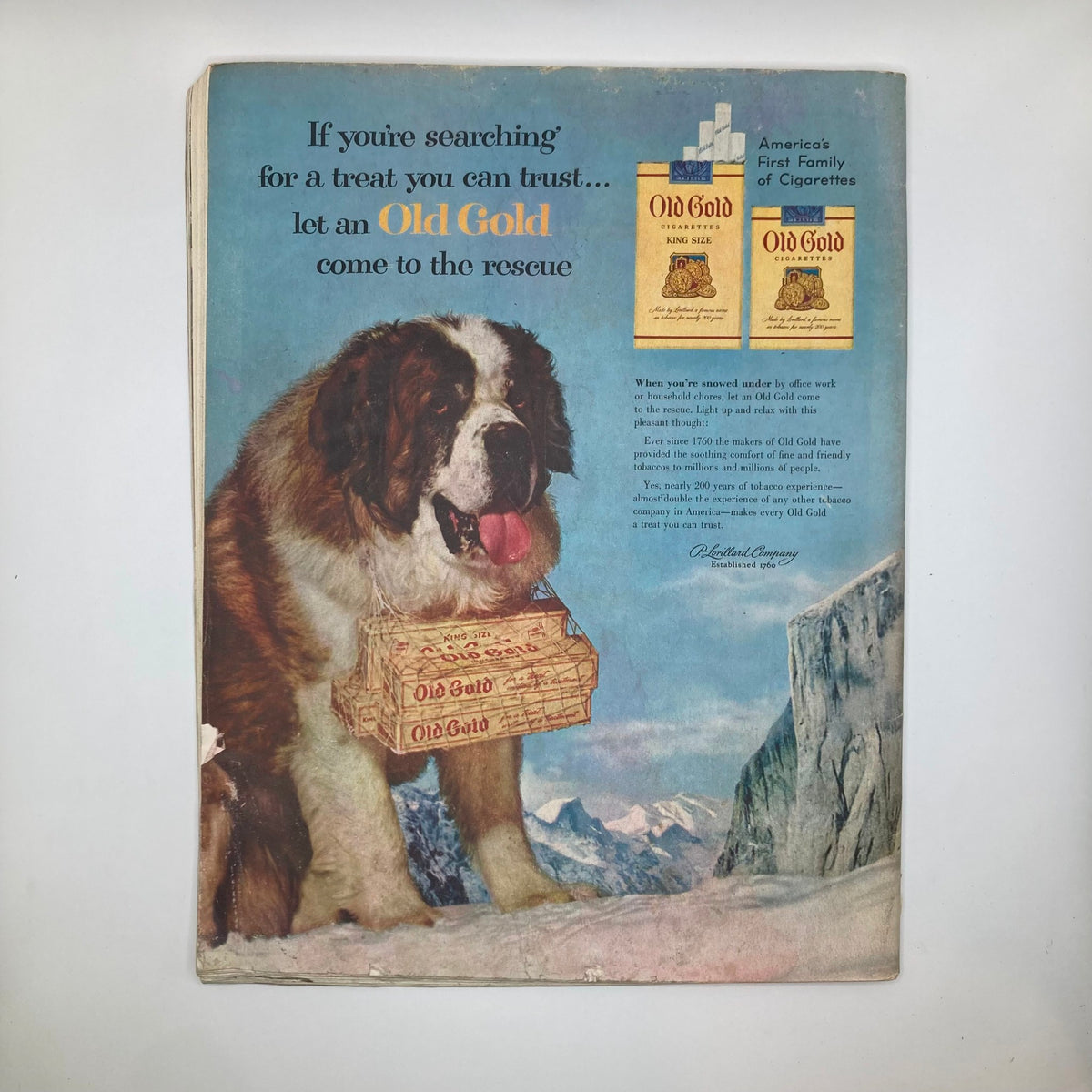 Back cover of Saturday Evening Post Magazine December 4 1954 featuring an Old Gold cigarette advertisement with a St. Bernard dog.