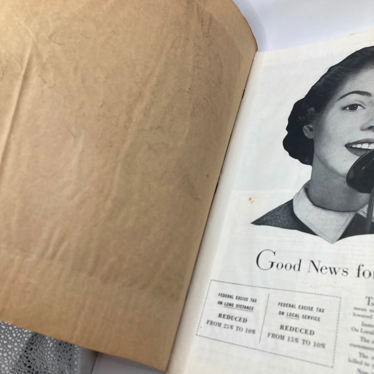 Interior page from the Saturday Evening Post Magazine dated May 15, 1954, showcasing an advertisement and a woman's portrait.