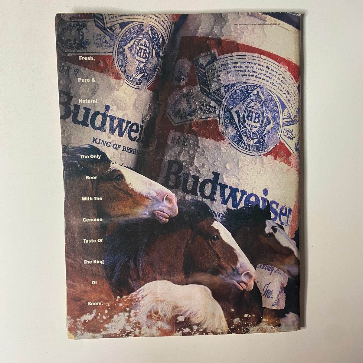 Advertisement page from Boxing Illustrated Magazine, November 1992, showcasing Budweiser with an artistic depiction of horses and an emphasis on its branding as 'The King of Beers'.