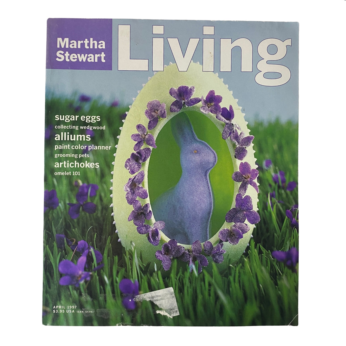 Cover of Martha Stewart Living Magazine, April 1997, featuring a large-view sugar egg for Easter surrounded by purple flowers and green grass, showcasing seasonal home decoration inspiration.