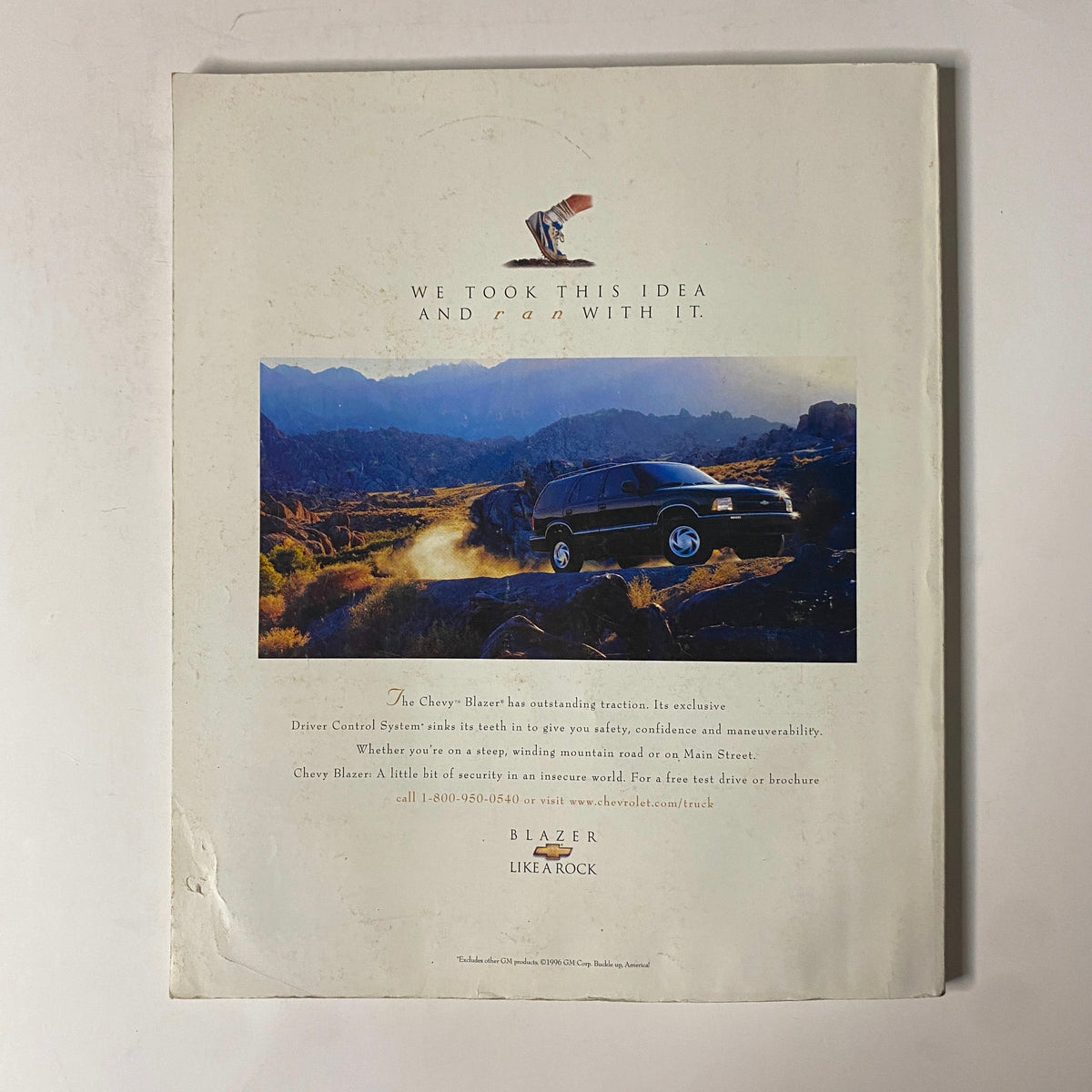 Back cover of Martha Stewart Living Magazine December 1996 featuring a Chevy Blazer advertisement highlighting its features and the tagline 'Like a Rock'.