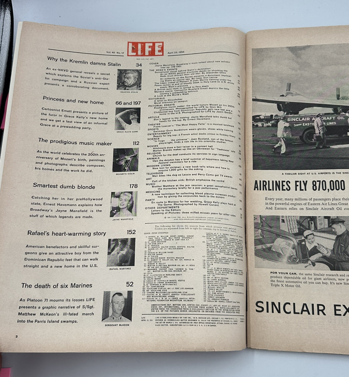 Interior of Life Magazine from April 23, 1956 featuring articles including 'Why the Kremlin damns Stalin' and 'Smartest dumb blonde,' highlighting cultural and political insights of the time.