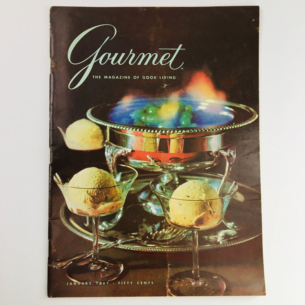 Cover of Gourmet Magazine of Good Living, January 1967, featuring elegant ice cream dessert presentation, showcasing culinary artistry and vintage gastronomy.