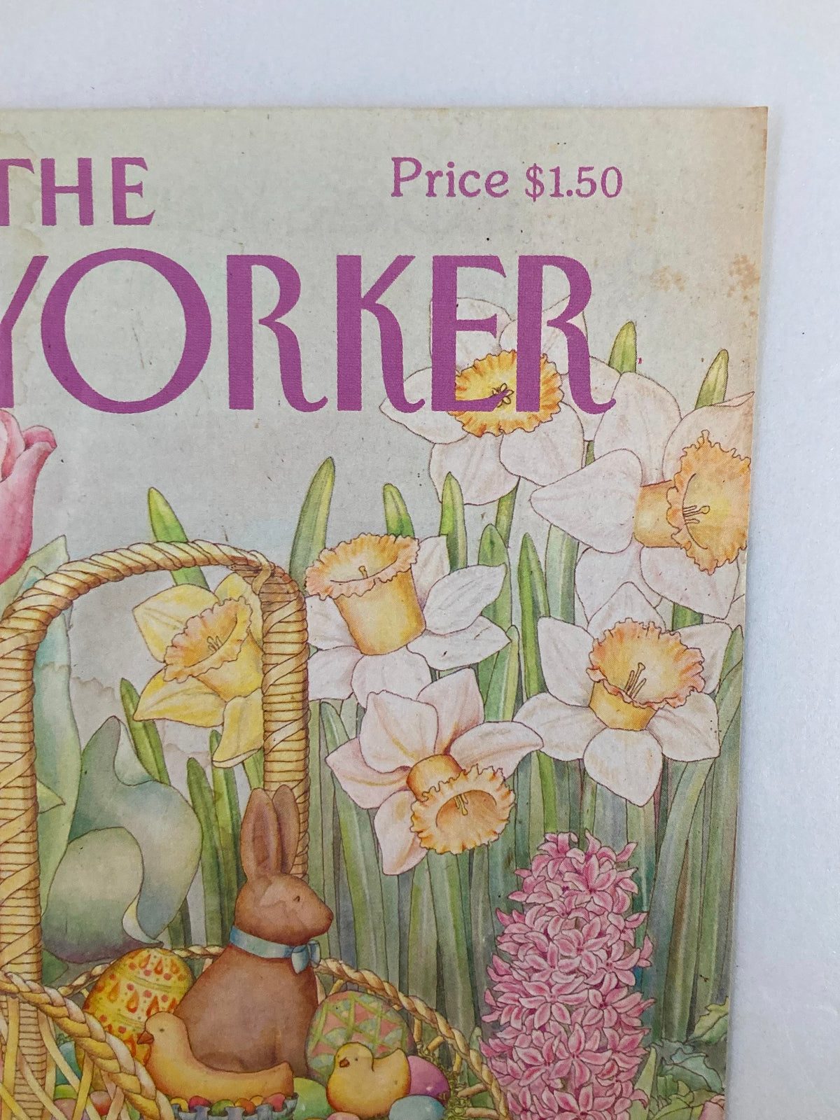 Cover of The New Yorker April 23, 1984 featuring Easter Bunny artwork by Jenni Oliver, with a price tag of $1.50 and colorful spring flowers including daffodils.