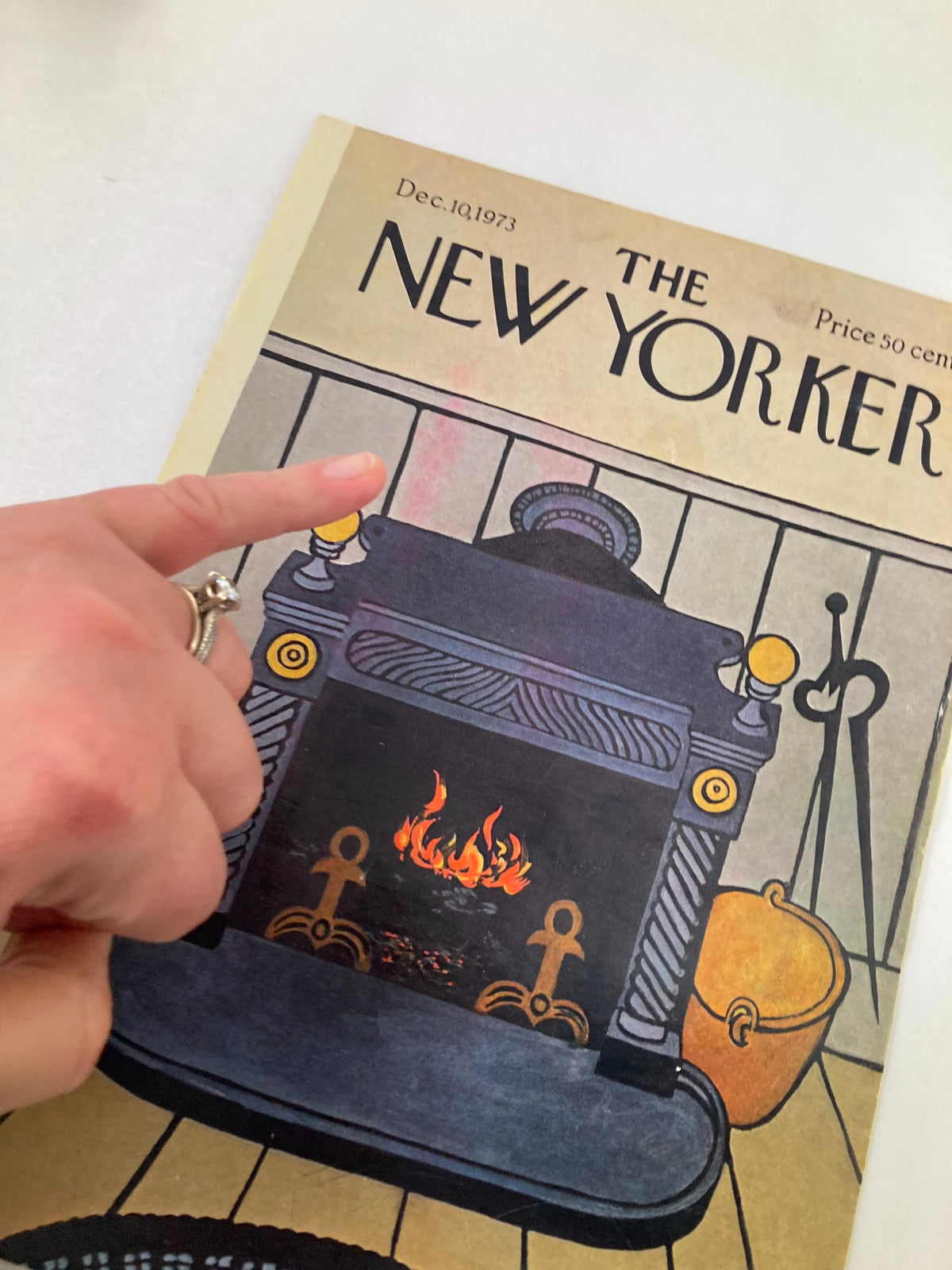 Cover only The New Yorker December 10 1973 with a focus on a fireplace design by Charles Martin, demonstrating nostalgic holiday charm.