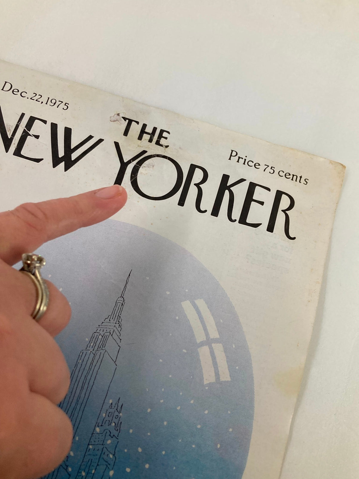 Close-up view of COVER ONLY The New Yorker December 22 1975 Snowglobe by R.O. Blechman, focusing on the artistic title and detailed illustration of the snow globe, highlighting its collectibility.