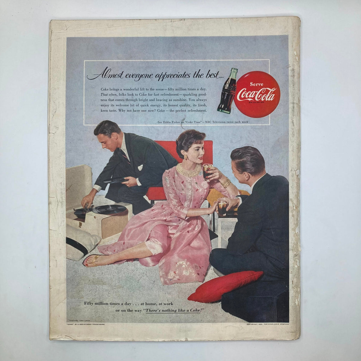 Vintage advertisement from Saturday Evening Post Magazine April 16 1955 featuring a social gathering with people enjoying Coca-Cola, showcasing mid-20th century Americana.