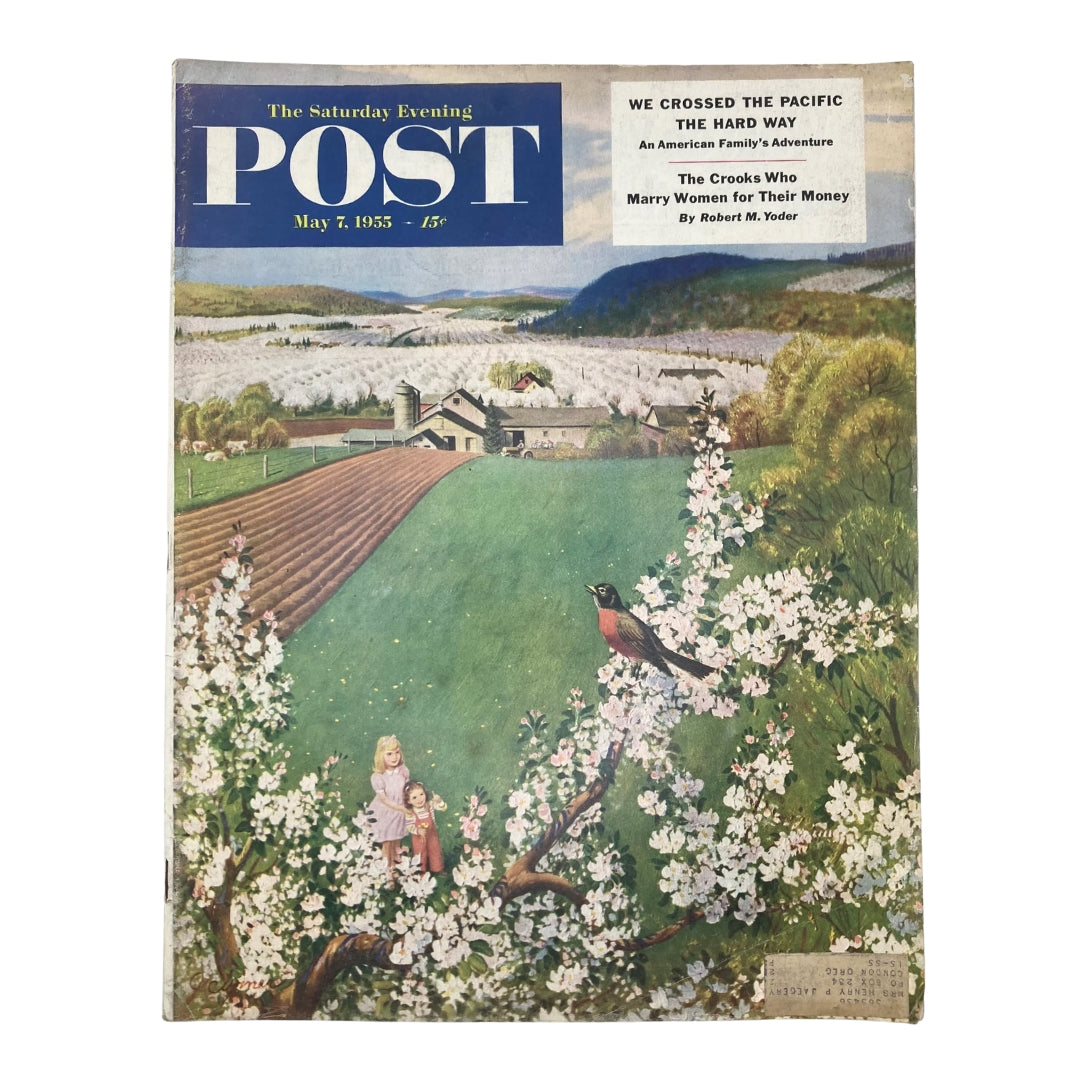 Cover of Saturday Evening Post Magazine May 7 1955 featuring artwork by John Clymer with a robin singing amid a spring landscape.