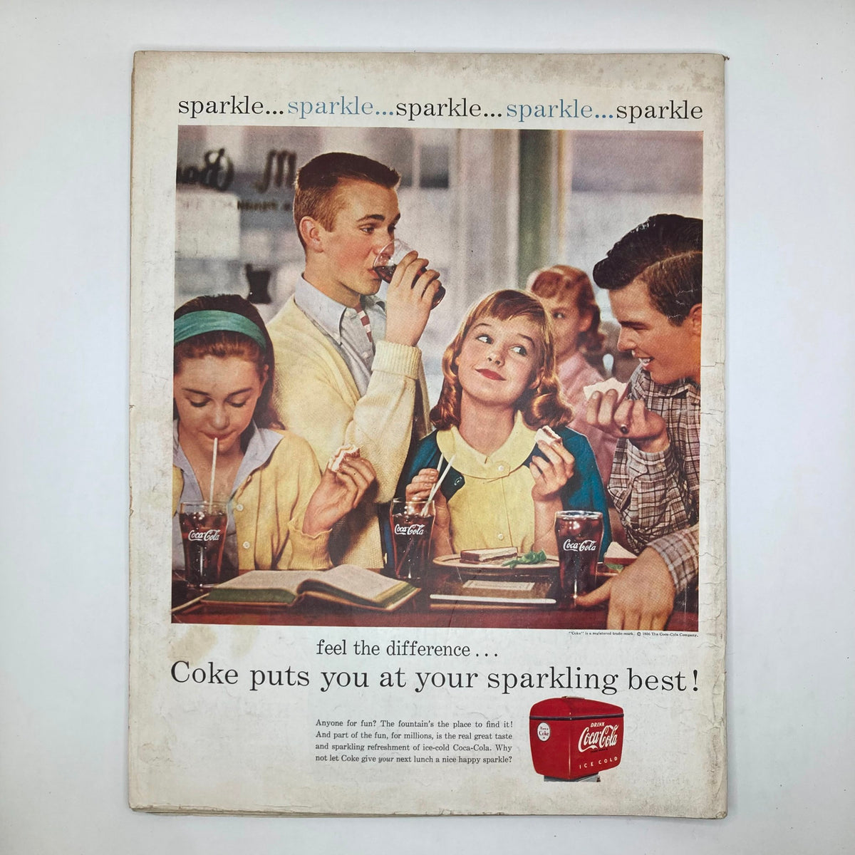 Vintage advertisement from the Saturday Evening Post Magazine September 29, 1956 titled 'Good-by For Keeps - Hughes', featuring a cheerful scene of children enjoying Coca-Cola with the tagline 'Coke puts you at your sparkling best!' showcasing mid-20th century Americana.