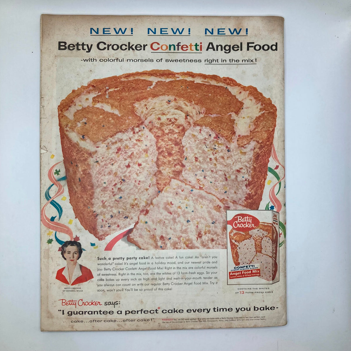 Advertisement for Betty Crocker Confetti Angel Food mix on the back cover of the Saturday Evening Post Magazine March 24, 1956, promoting a colorful cake mix.