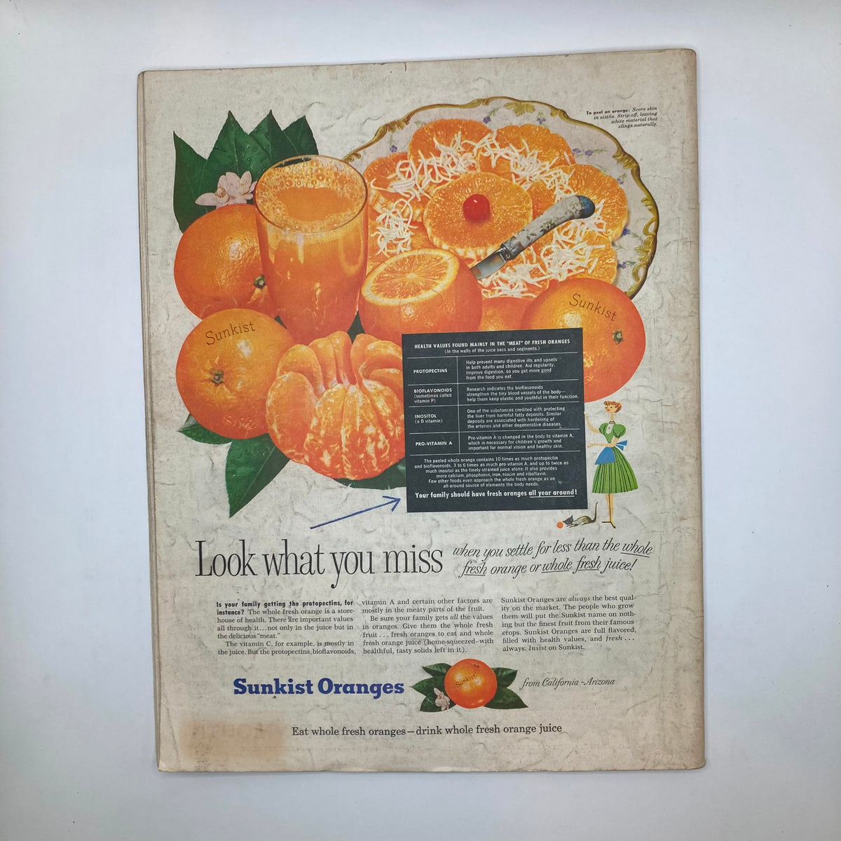 Advertisement page from the Saturday Evening Post Magazine July 30 1955 promoting Sunkist Oranges, with a colorful depiction of fresh oranges and a glass of orange juice.