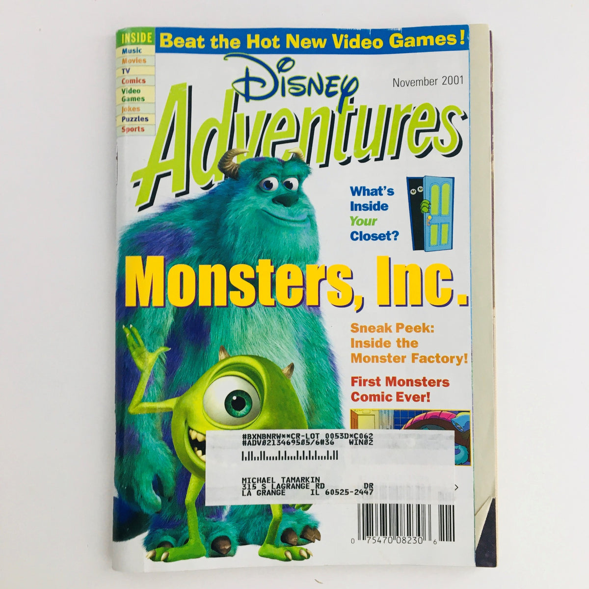 Cover of Disney Adventures Magazine November 2001 featuring Monsters, Inc. and a sneak peek inside the Monster Factory.