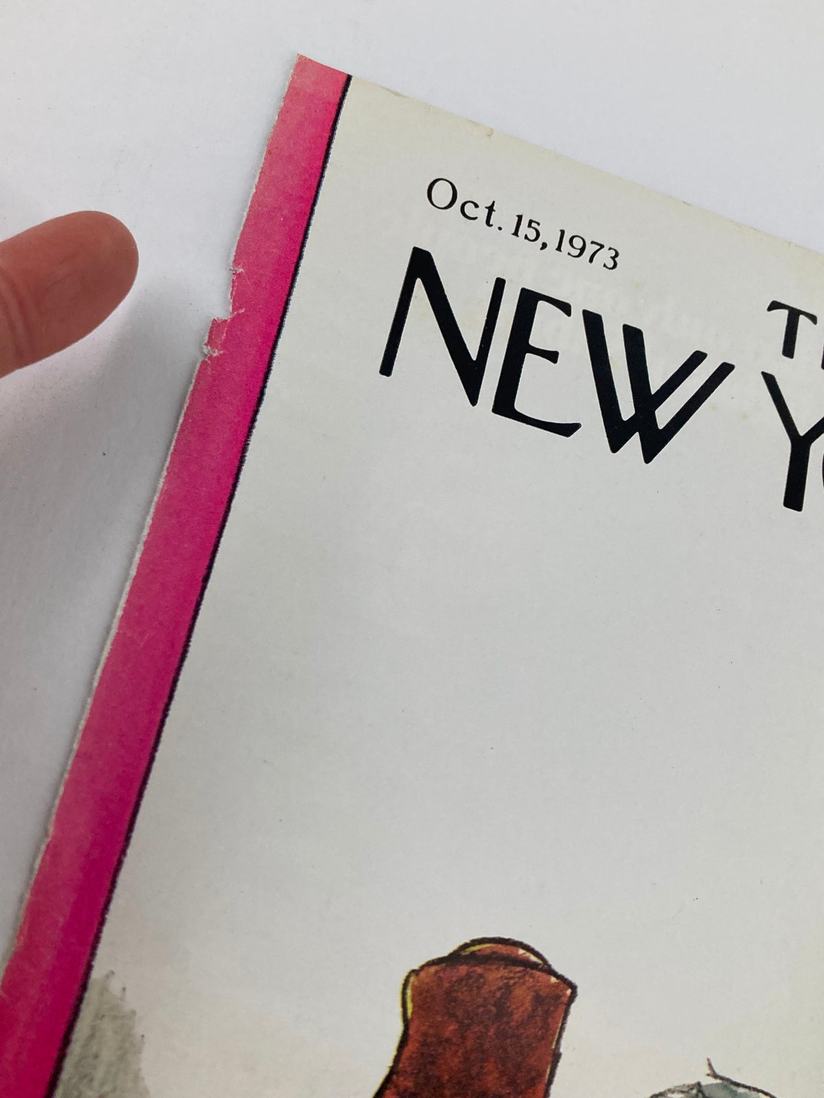 Close-up view of the October 15, 1973 cover of The New Yorker titled "A Vote For" by Charles Saxon, highlighting the edge of the cover with some wear visible.