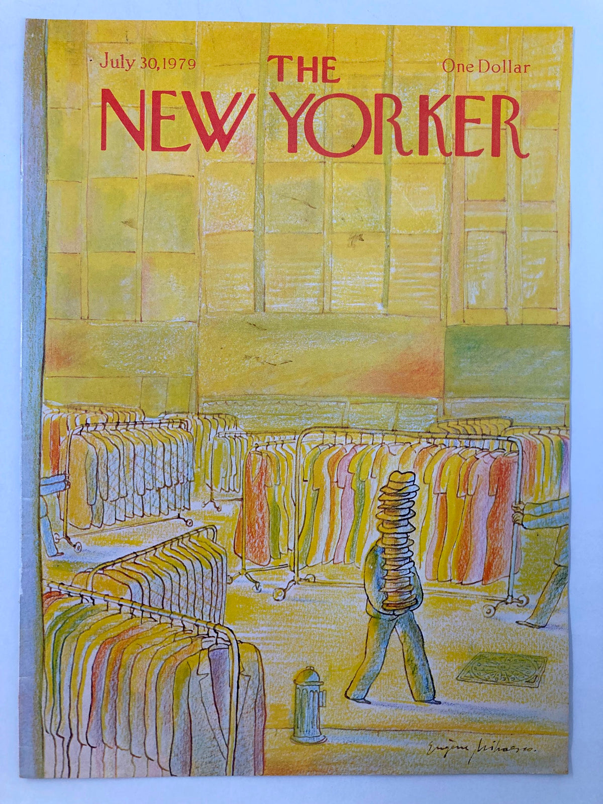 Cover of The New Yorker, July 30, 1979, titled 'Hat for Sale' by Eugene Mihaesco, featuring an illustration of a person carrying hats surrounded by clothing racks, depicted in soft colors.