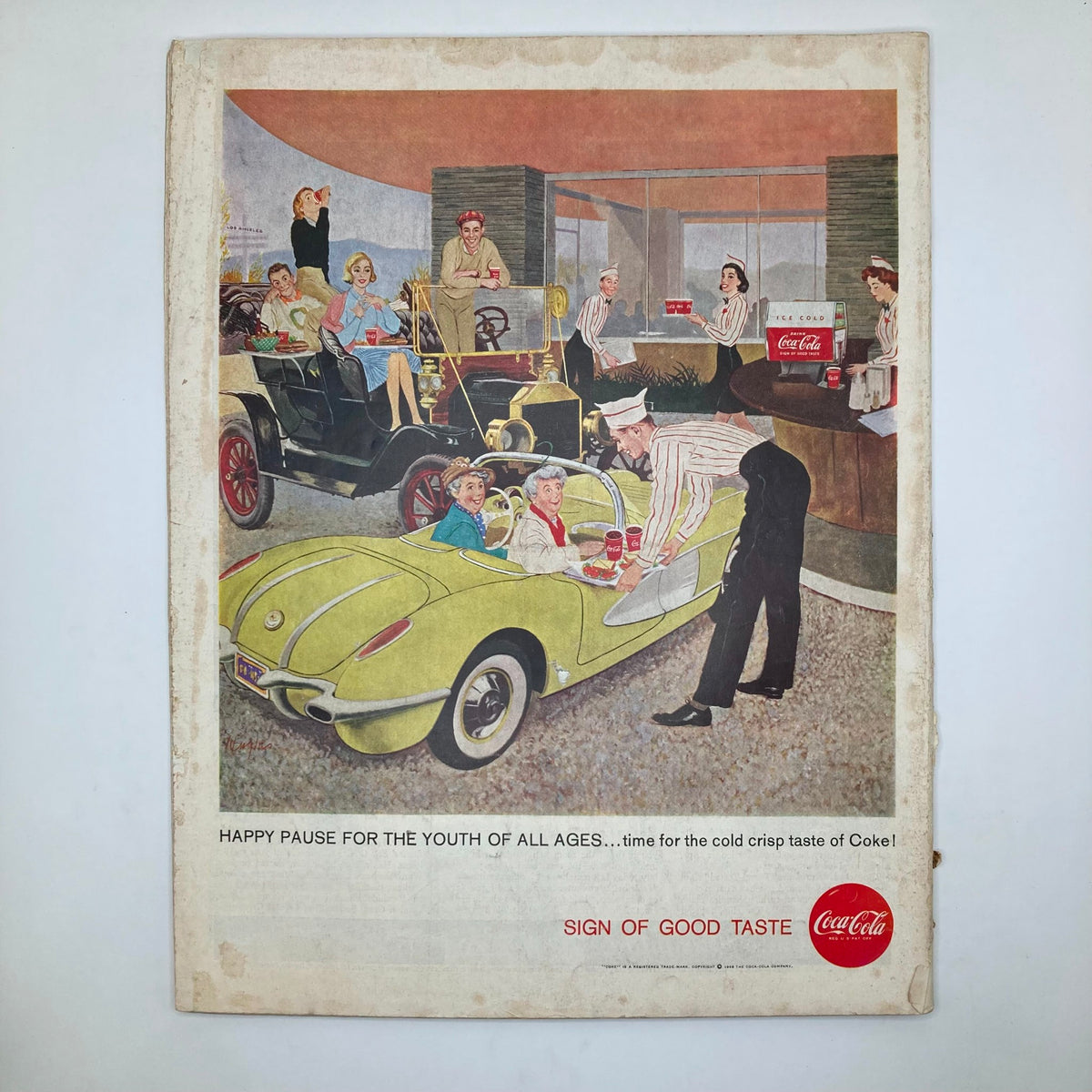 Back cover of the Saturday Evening Post Magazine, September 27, 1958, displaying a vintage Coca-Cola advertisement with people enjoying refreshments at a drive-in.