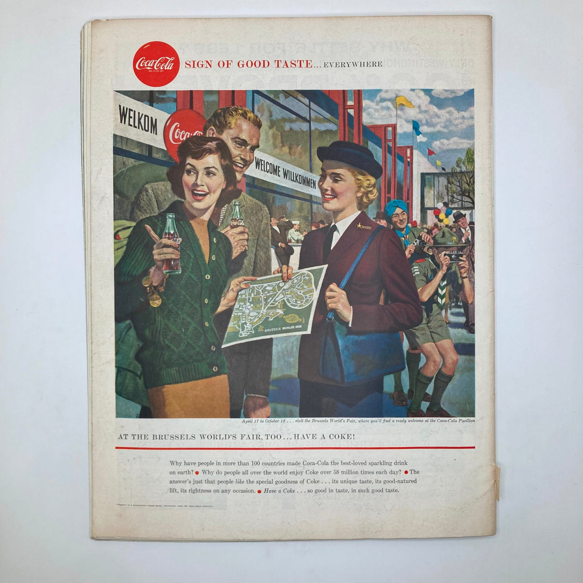 Back cover of the Saturday Evening Post Magazine April 12, 1958 highlighting a Coca-Cola advertisement at the Brussels World's Fair, promoting a refreshing drink experience.