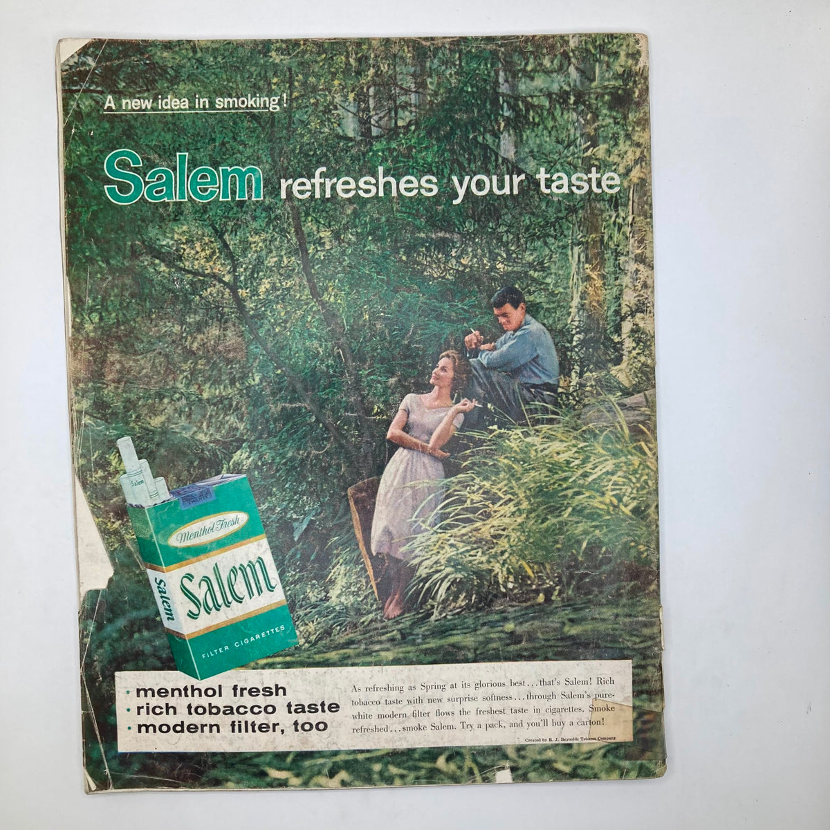 Vintage advertisement page from the Saturday Evening Post Magazine April 5, 1958 promoting Salem cigarettes, showcasing a couple in a natural setting with the product prominently featured.