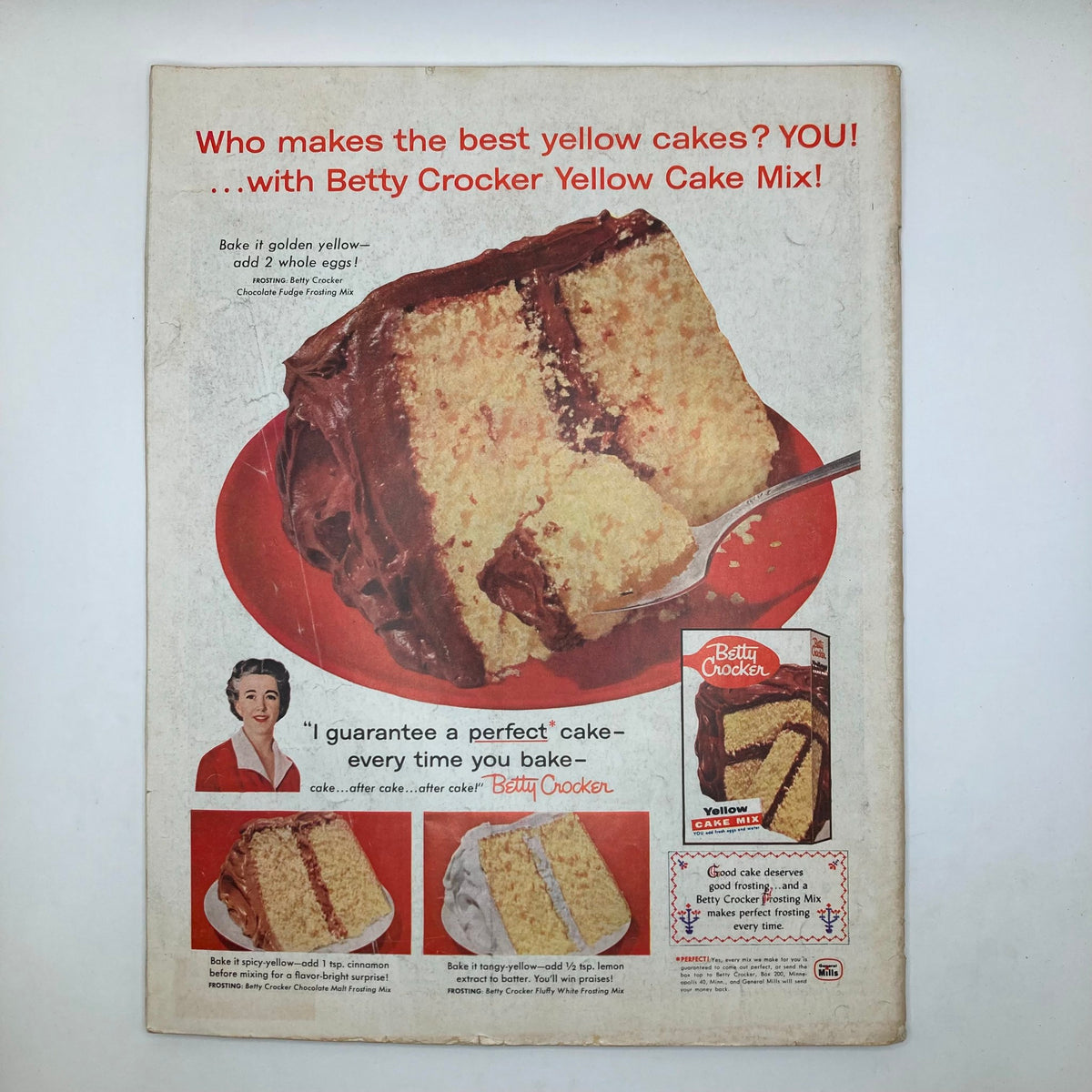 Advertisement for Betty Crocker Yellow Cake Mix featuring a delicious yellow cake with chocolate frosting, promoting baking with Betty Crocker.