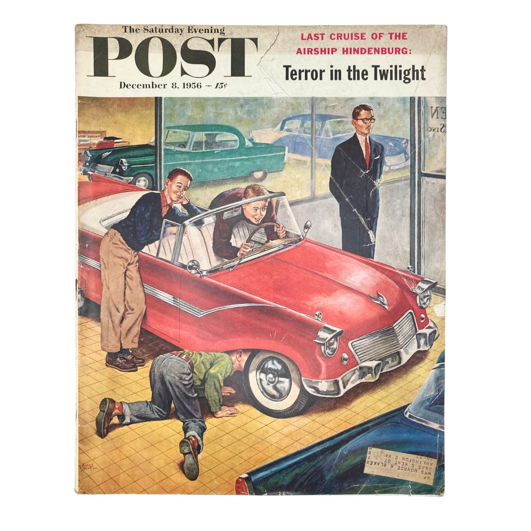 Cover of Saturday Evening Post Magazine December 8 1956 featuring chic cars, depicting a vintage scene with young boys examining a car and a man in a suit, embodying mid-century automotive culture.