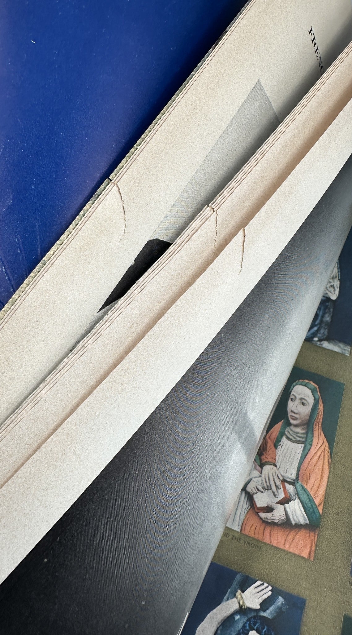 Flair Magazine December 1950 Christmas Issue - Close-up of page showing partial tear and spine condition.