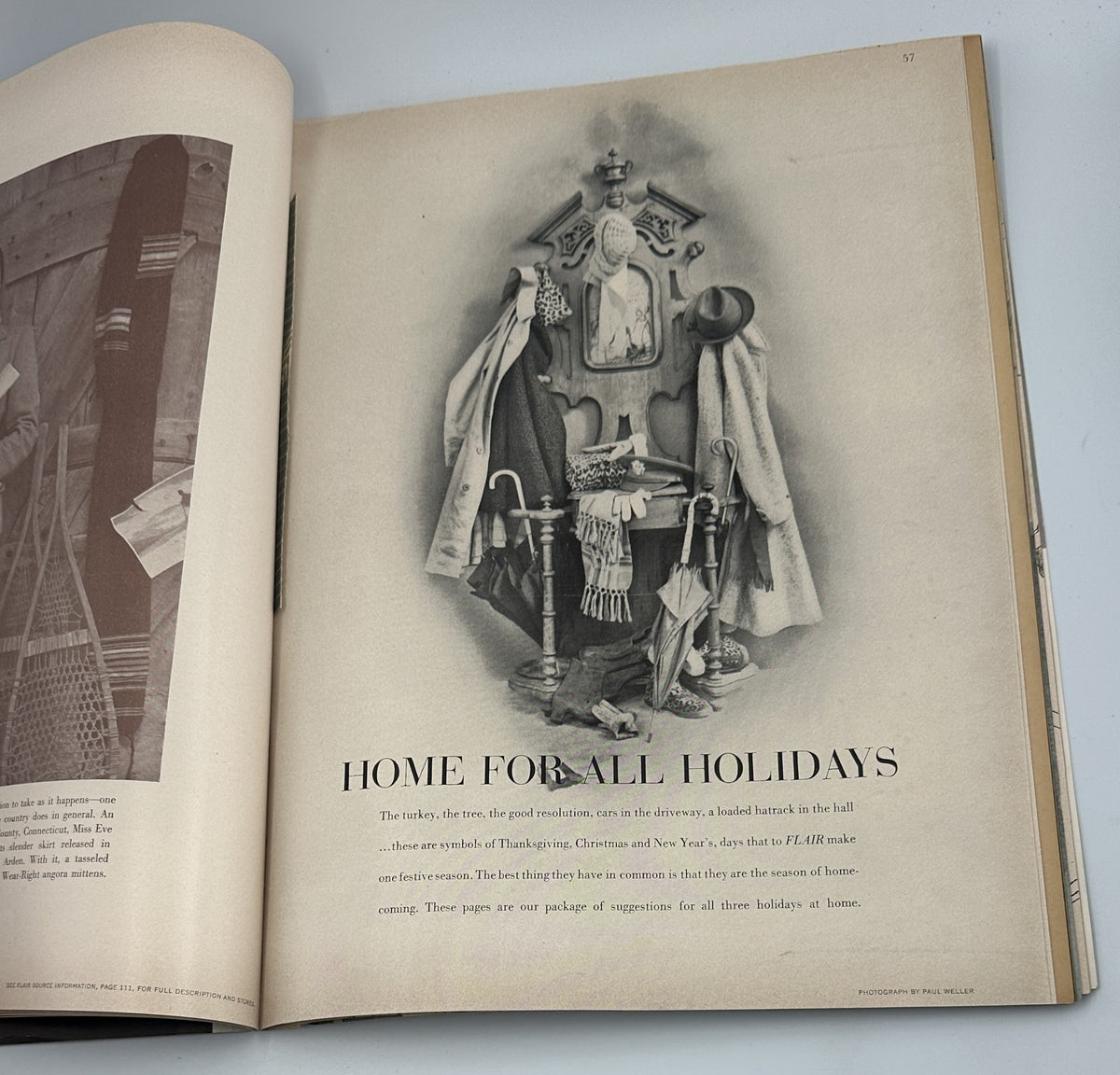 Article page from Flair Magazine November 1950 discussing holiday home decor, showcasing an artistic display of winter clothing and accessories.