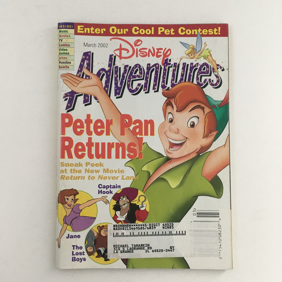 Cover of Disney Adventures Magazine from March 2002 featuring Peter Pan, highlighting the theme 'Peter Pan Returns!'. Includes characters like Captain Hook, Jane, and The Lost Boys.