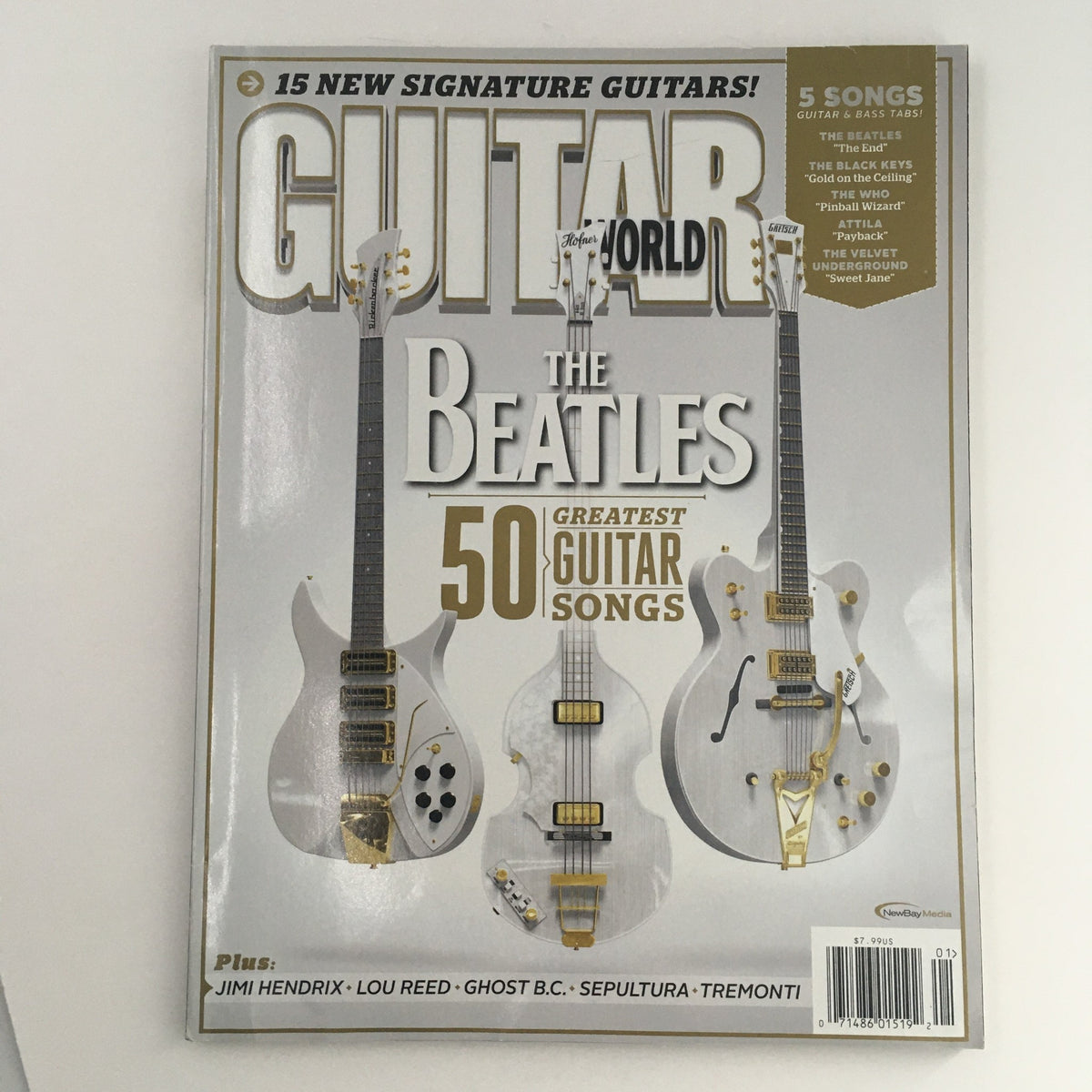 Guitar World Magazine January 2014 featuring The Beatles on the cover, showcasing '50 Greatest Guitar Songs' with images of three signature guitars.