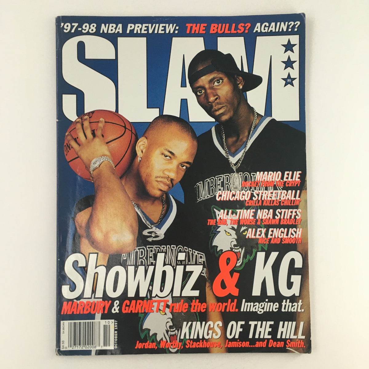 Cover of Slam Magazine from October 1997 featuring Stephon Marbury and Kevin Garnett with bold text stating 'Showbiz & KG: Marbury & Garnett rule the world. Imagine that.' The magazine reflects a pivotal moment in NBA history.