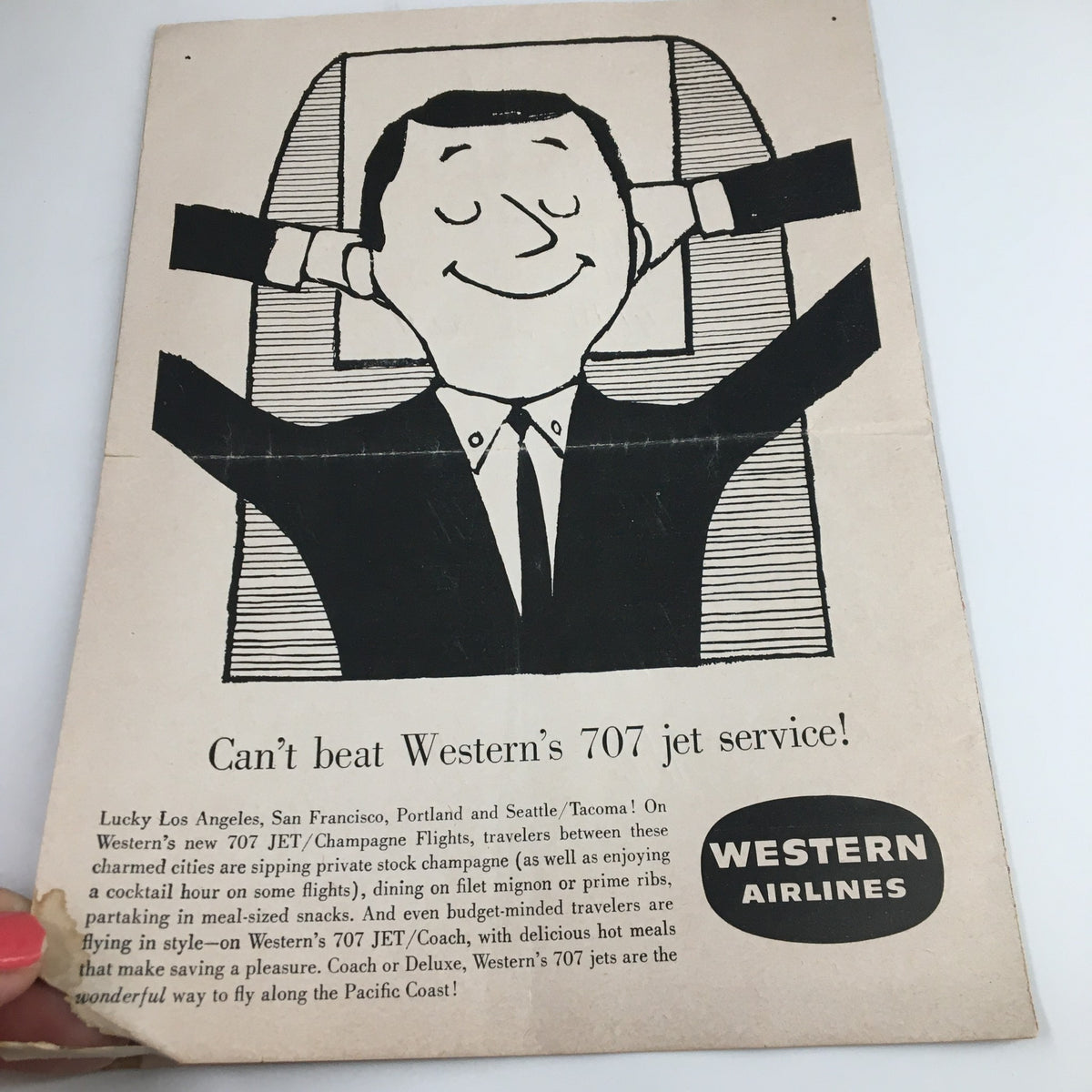 Back cover of the March 10, 1960 NCAA Basketball UCLA vs Stanford Official Program, featuring a Western Airlines advertisement with a smiling man in a suit.