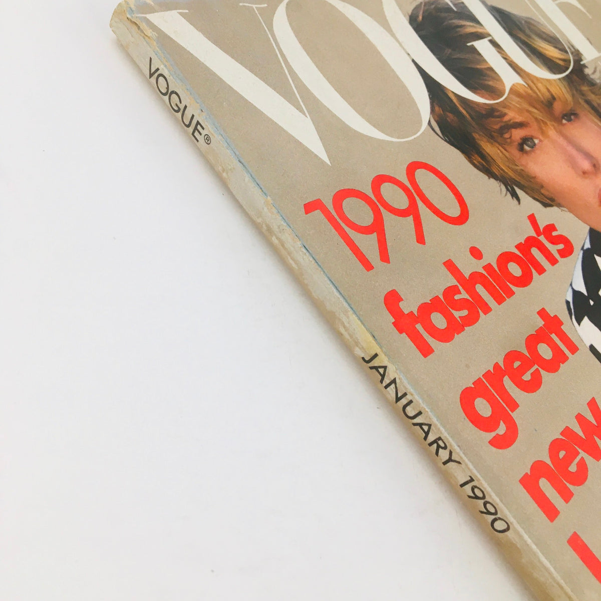 Side view of Vogue Magazine January 1990 showcasing the spine and title with a bold red design, featuring Tatjana Patitz on the cover.