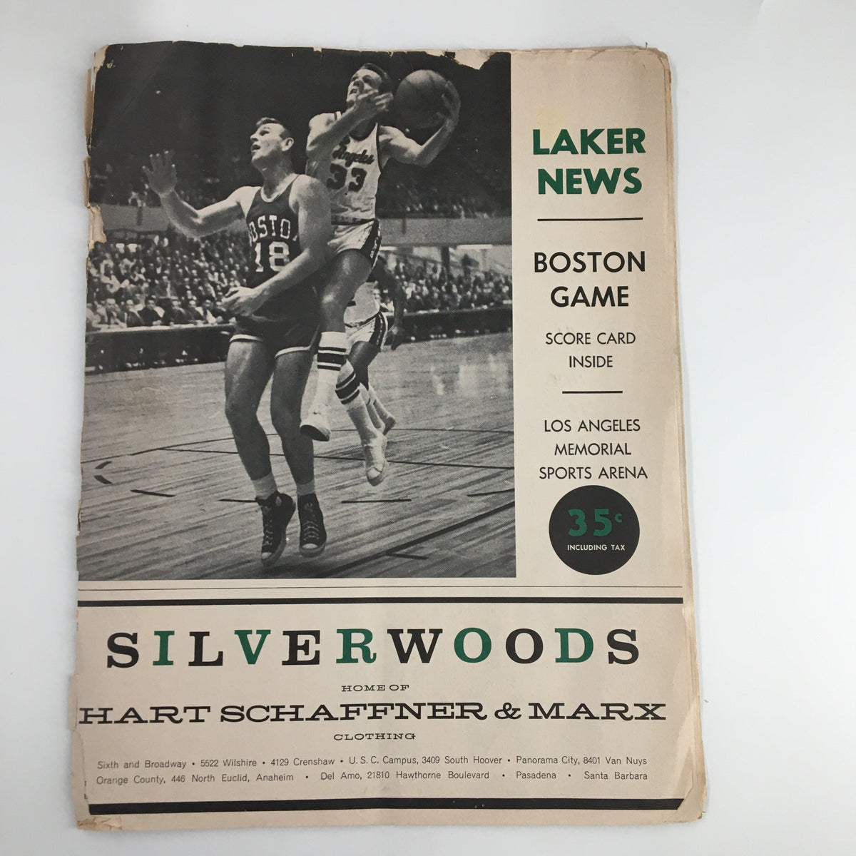 1961-1962 Jim Loscutoff Rod Hundley Los Angeles Lakers Boston Game Program front cover featuring basketball action, Laker News, and details of the Boston game, preserving vintage sports memorabilia.