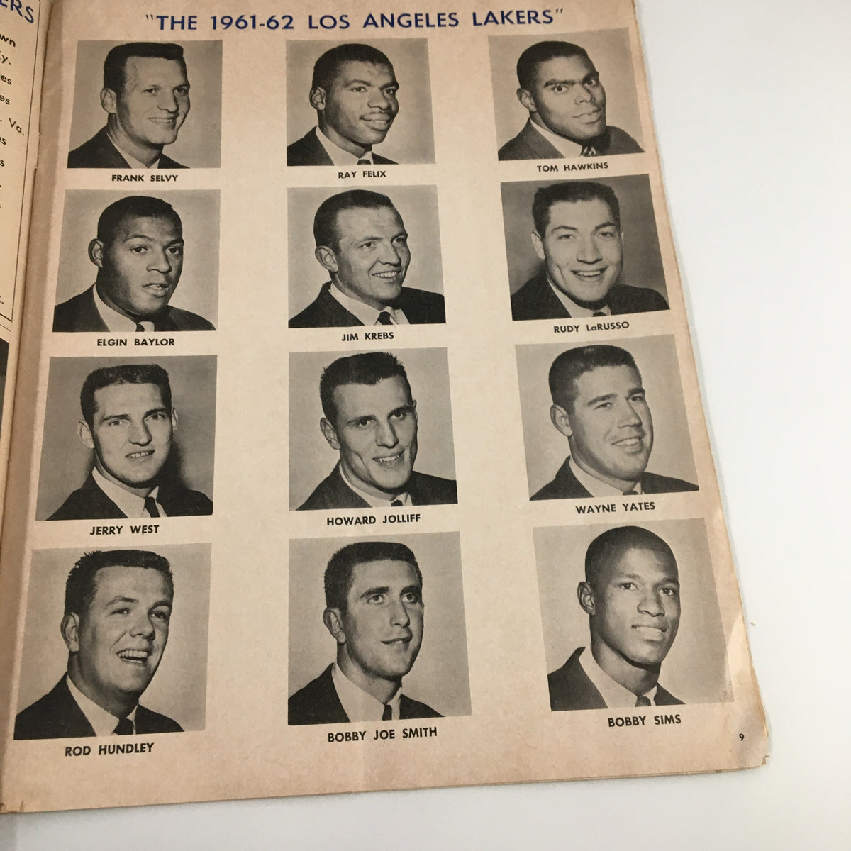 1961-1962 Jim Loscutoff Rod Hundley Los Angeles Lakers Boston Game Program showing portraits of the Lakers team members, emphasizing notable players of the era.
