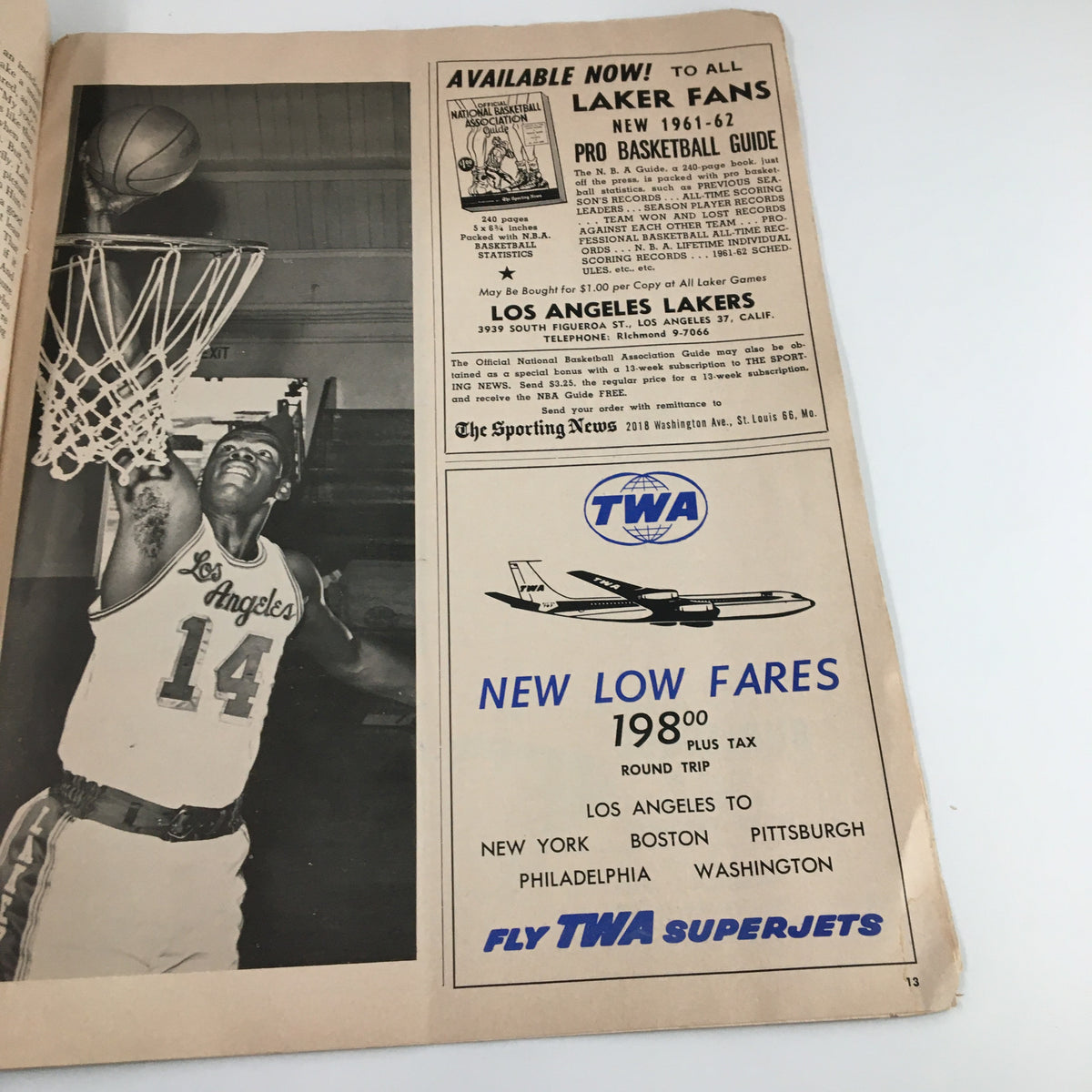 1961-1962 Jim Loscutoff Rod Hundley Los Angeles Lakers Boston Game Program with an advertisement promoting the Lakers and TWA airlines featuring a vintage basketball scene.