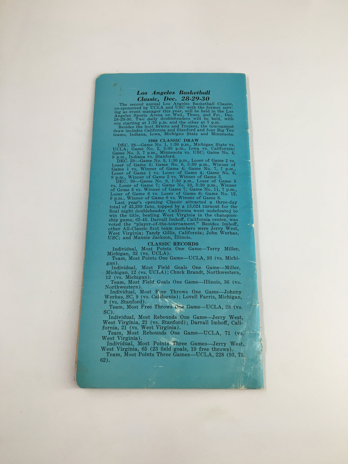 Back cover of the 1960-1961 NCAA UCLA Bruins Varsity Basketball Schedule Program featuring details of the Los Angeles Basketball Classic held on December 28-30, 1960.