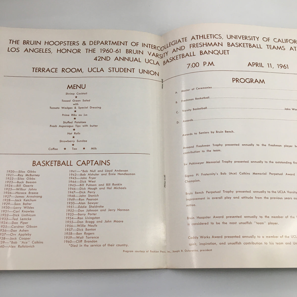 1960-1961 NCAA UCLA Bruins Annual Basketball Banquet program page featuring menu items and honors for basketball captains.