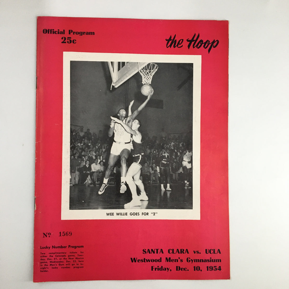 Official program cover for December 10 1954 NCAA Basketball Santa Clara vs UCLA featuring a basketball player dunking and event details.