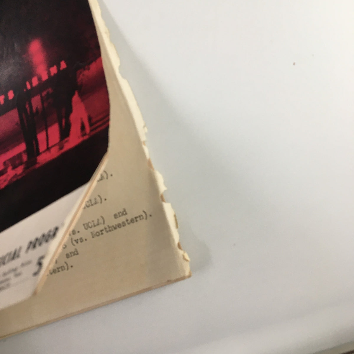 Detail of the spine of the December 28 1959 NCAA UCLA vs Michigan Basketball Classic Official Program, showing minor wear and age typical for its time.
