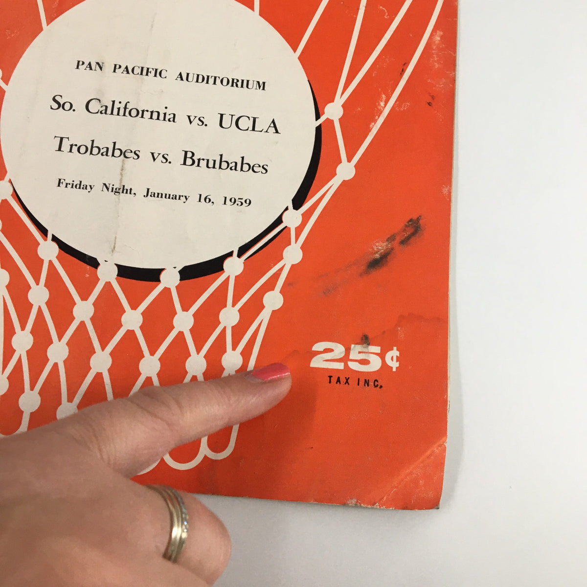Detail of the January 16 1959 NCAA Basketball Program showing the price of 25 cents and event details for Southern California vs UCLA at the Pan Pacific Auditorium.