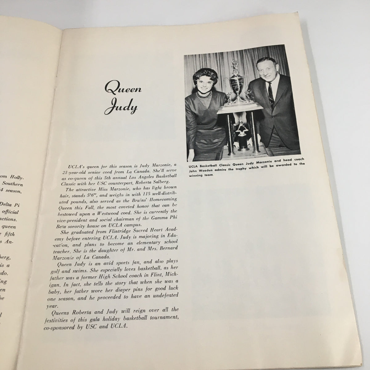 Queen Judy Marzonie at the 1963 NCAA UCLA vs Utah State Basketball Classic Official Program alongside head coach John Wooden, showcasing the vintage basketball memorabilia.