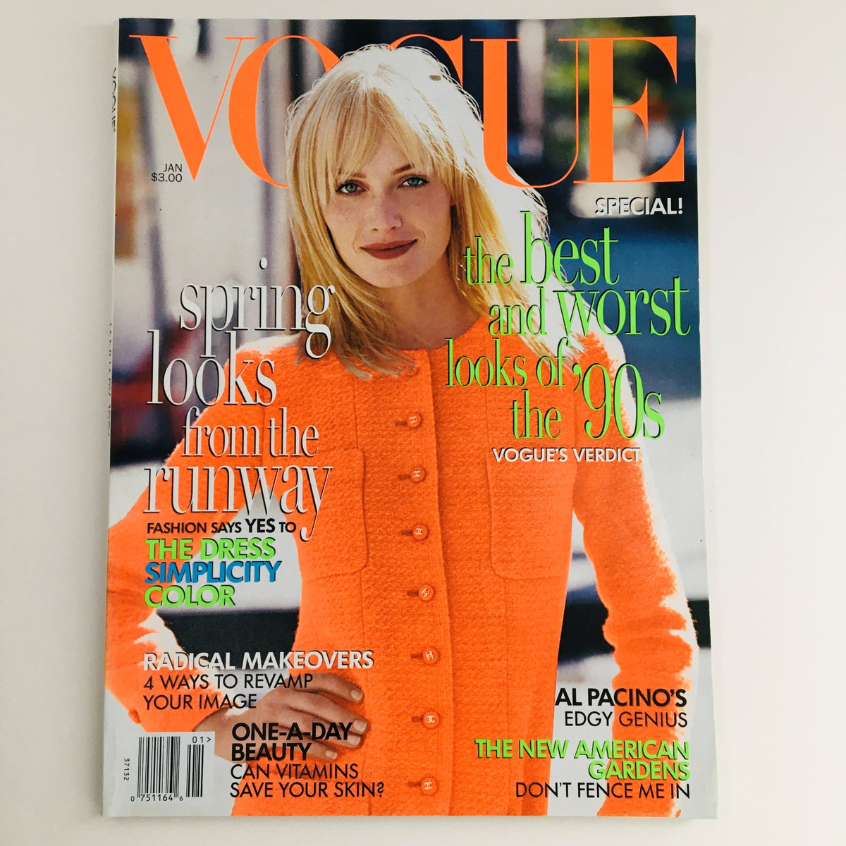 Vogue Magazine January 1996 featuring American model Amber Valletta on the cover, showcasing spring fashion looks from the runway, with eye-catching typography highlighting trends of the 90s.