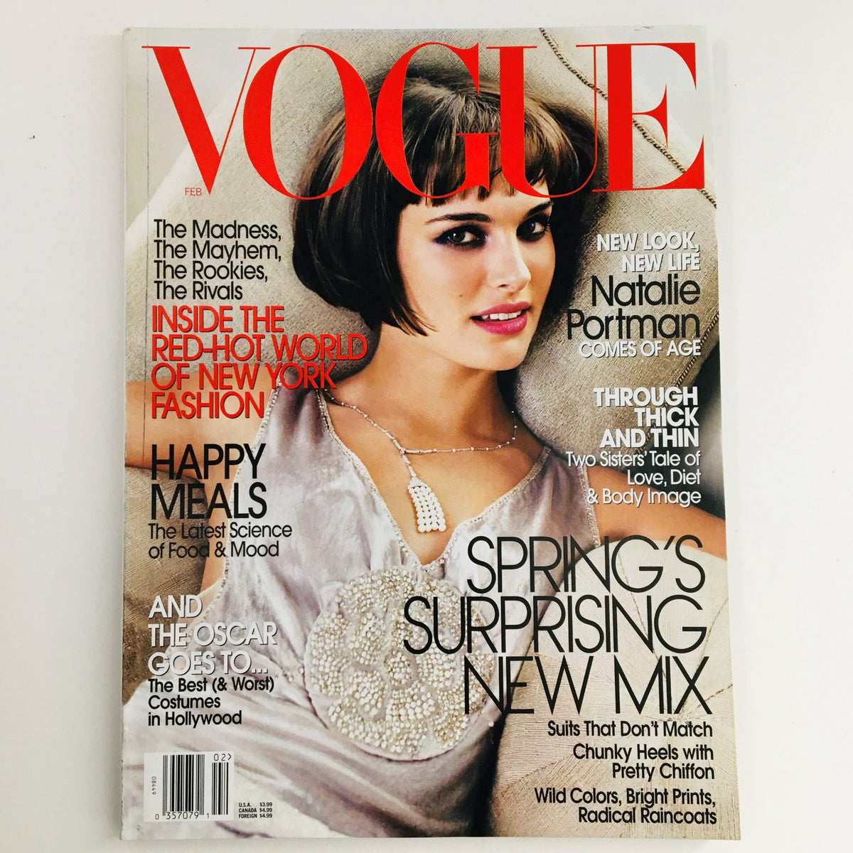Vogue Magazine February 2004 featuring American actress Natalie Portman on the cover, showcasing a fashion editorial titled 'Spring's Surprising New Mix' with a chic hairstyle and stylish outfit.