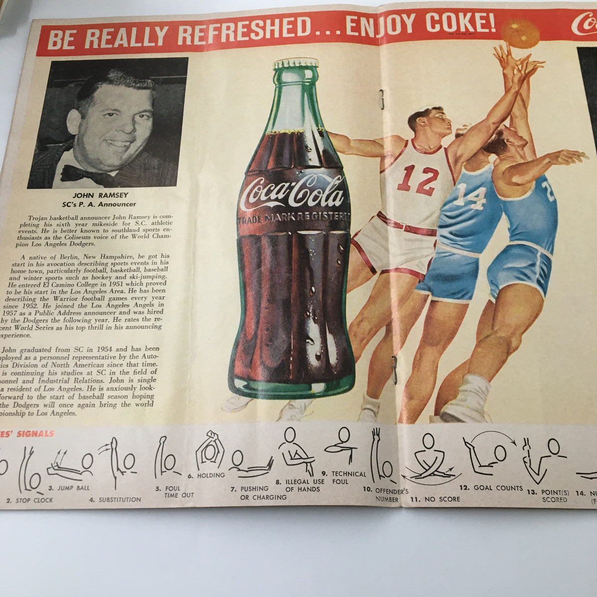 Promotional page from the March 5 1960 NCAA Basketball SC vs UCLA The Hoop Official Program featuring a Coca-Cola advertisement and an image of SC player John Ramsey.